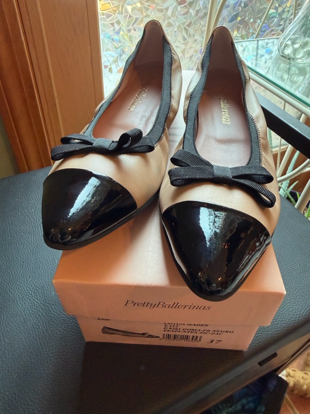 Pretty Ballerinas Nude Leather Ballet Flats with Black Cap Toe and Bow